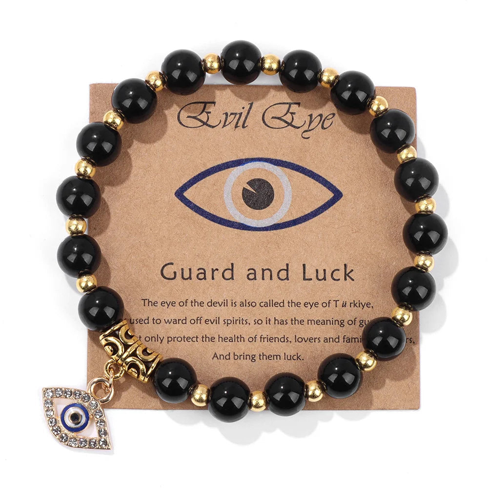 Perlenarmband aus Onyx, Sodalith & Türkis mit prominentem Böses-Auge Anhänger. Unisex Design für Schutz & Eleganz.