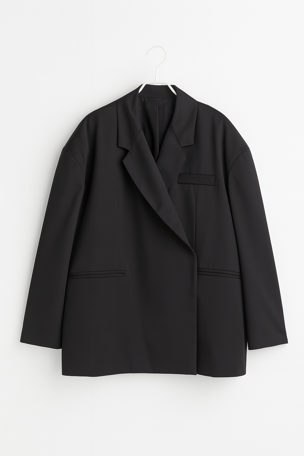 Rückenansicht: Eleganter knopfloser Damen Blazer im Oversize-Schnitt. Für einen luxuriösen, lässigen Look.