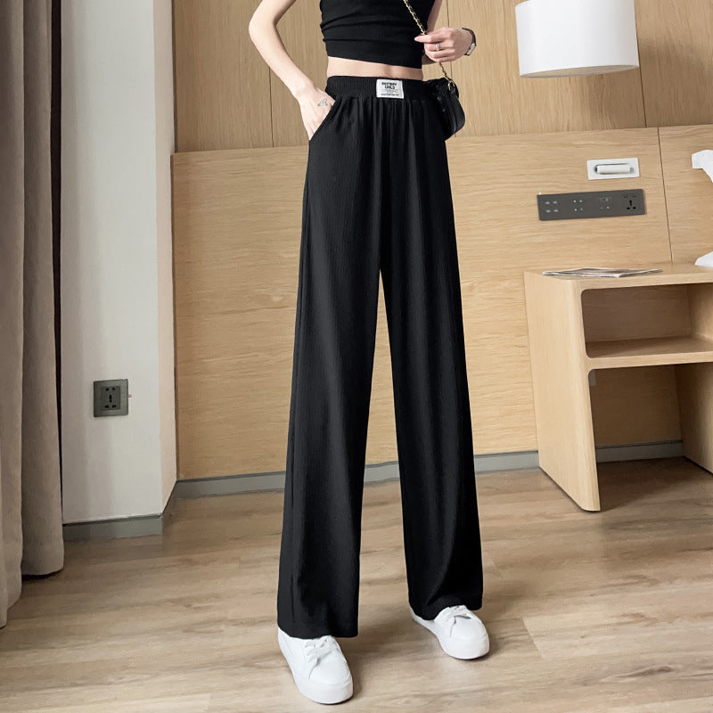 Bequeme Sommerhose für Damen mit hohem Bund & lockerem, weitem Bein, perfekt für Strand oder Freizeit.