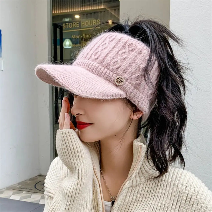 Lässige Damen Winter Baseballmütze, ideal für trendige Herbst- und Winter-Looks. Hält den Kopf angenehm warm.