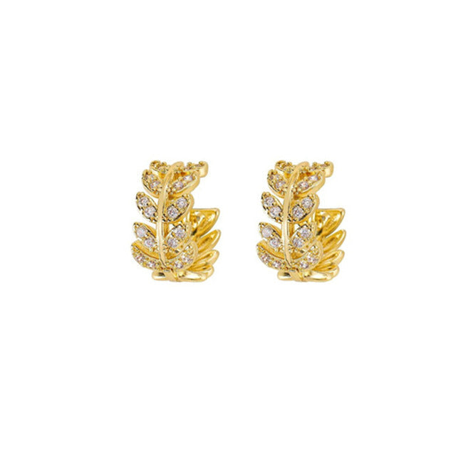 Luxuriöse Damen Creolen mit funkelnden Diamanten in Weißgold und strahlendem Gelbgold.