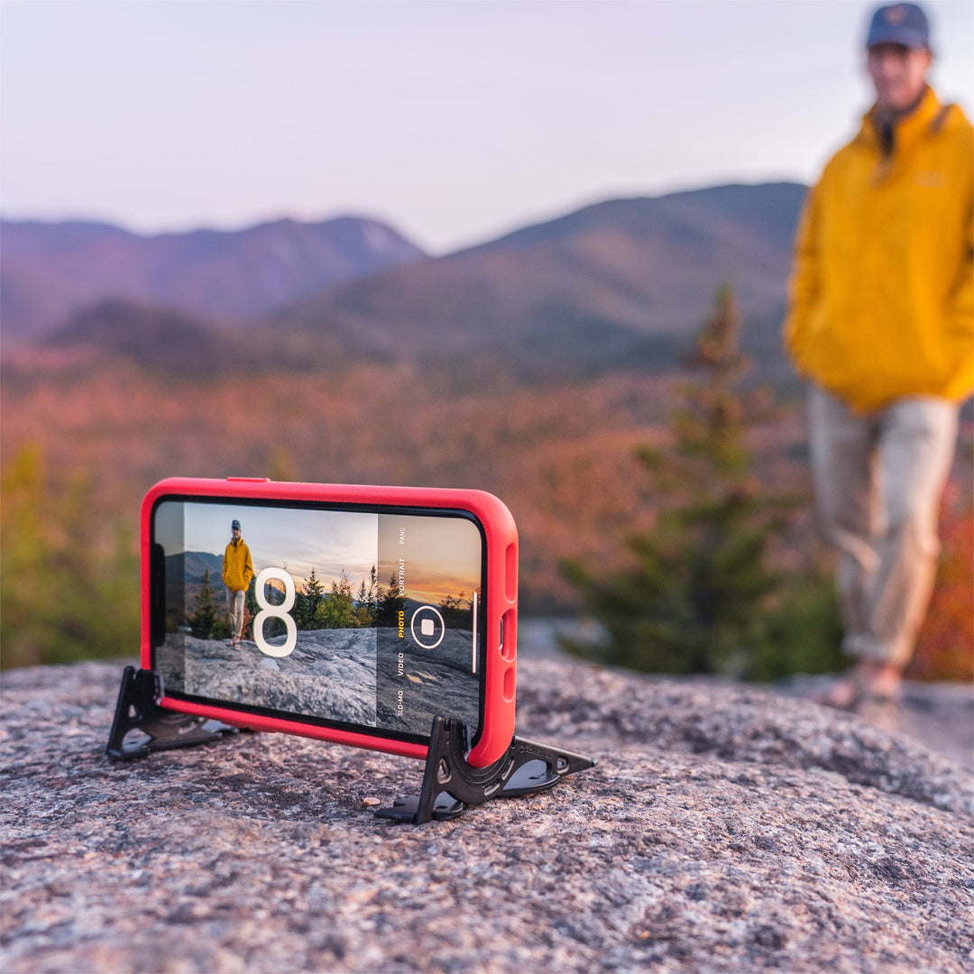 Lila Telefonstativ, kompakt & leicht, perfekt für Reisefotos und Videoproduktionen.