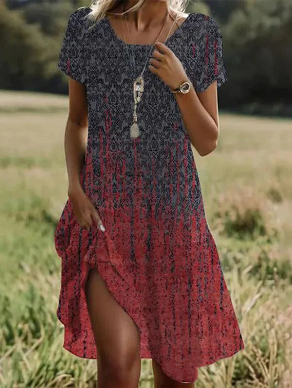 Damen Sommerkleid mit Blumenmuster. Midi-Länge, Kurzarm, perfekt für Urlaub & Freizeit.