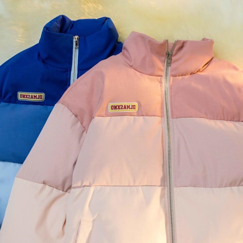 Stilvolle, warme Damen Winterjacke in Puffer-Optik. Trendiges Colorblock-Design, perfekt für kalte Wintertage.