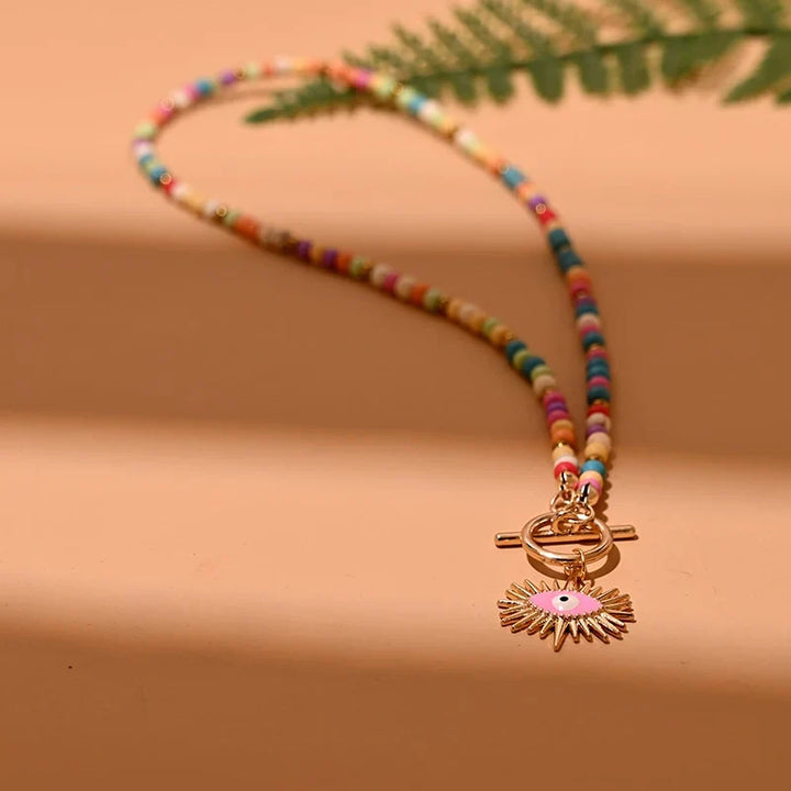 Elegante Damen Perlen-Choker-Halskette mit Evil Eye Anhänger, handgemachter Modeschmuck.