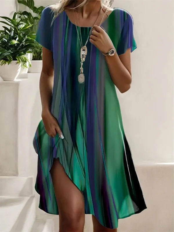 Damen Blumen Midi-Kleid mit Rundhals-Ausschnitt & Kurzarm. Stilvolles, bequemes Sommerkleid.