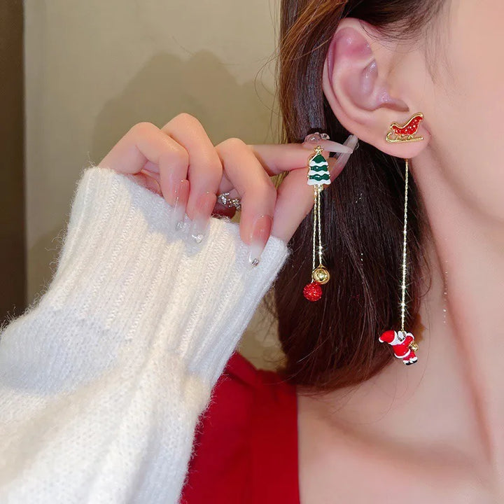 Elegante Damen-Weihnachtsohrringe mit langen weißen Quasten und detaillierten Schneeflocken für festliche Anlässe.