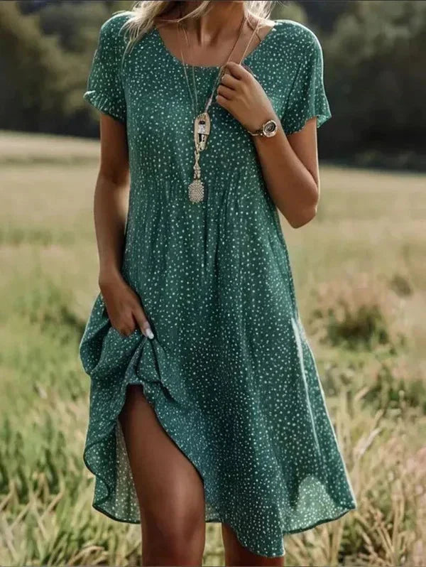 Modisches Damen Blumen Midi-Kleid, locker geschnitten. Perfekt für Frühling, Sommer & Alltag.
