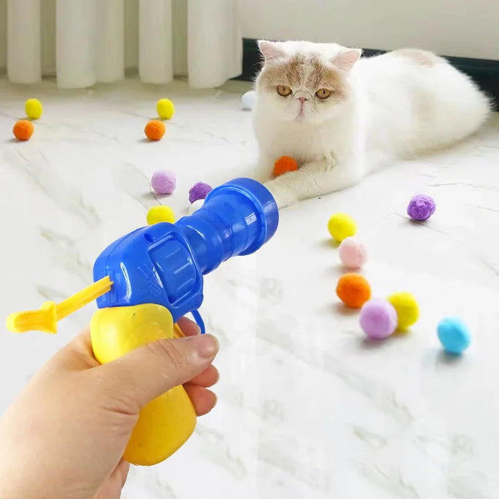 Interaktive Katzen Spielzeug-Kanone, bunt, fördert Jagdinstinkt und Bewegung für verspielte Stubentiger.