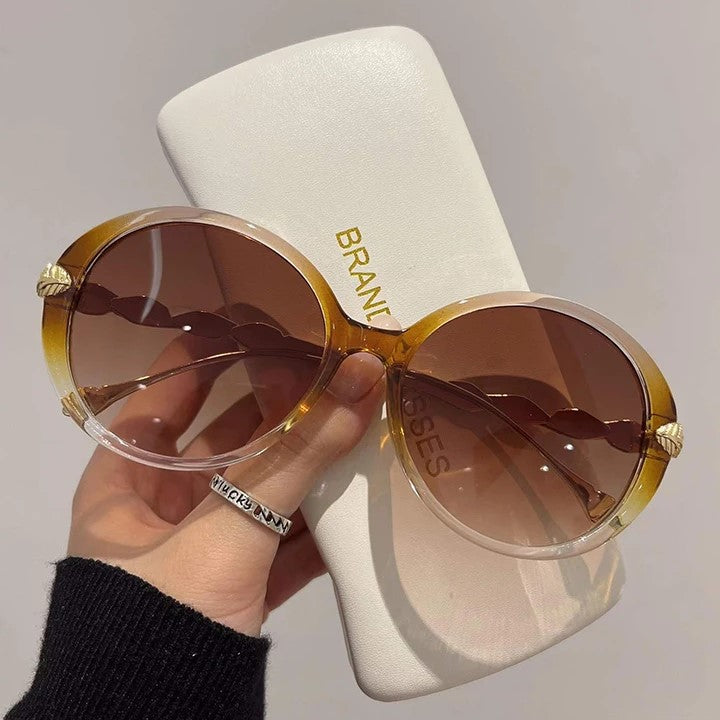 Elegante runde Vintage Damen Sonnenbrille. Farbverlauf Gläser bieten stilvollen UV400 Schutz für den Sommer.