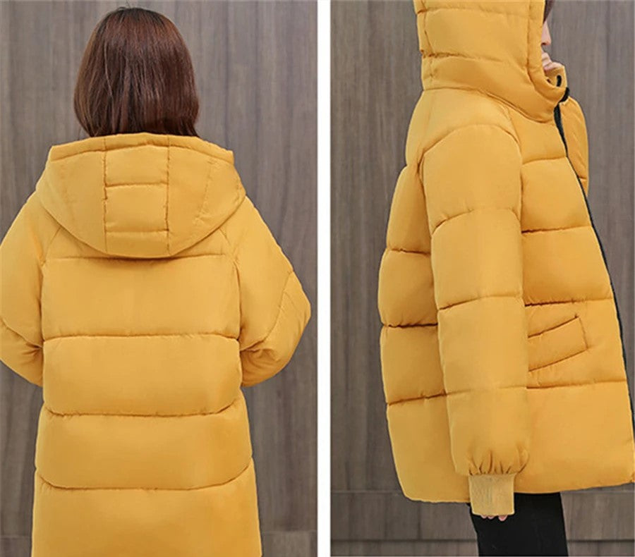 Damen Puffer Winterjacke, mit Kapuze, Oversize Passform für maximalen Komfort.