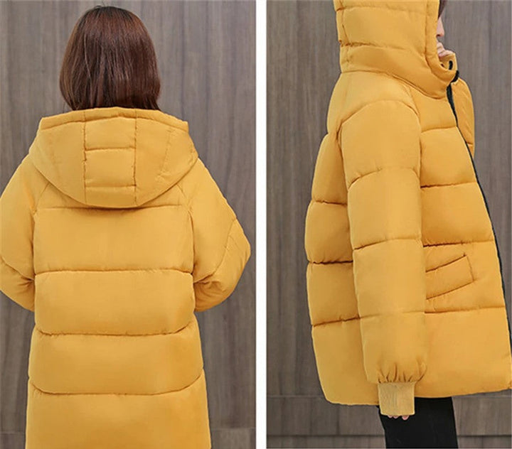 Damen Puffer Winterjacke, mit Kapuze, Oversize Passform für maximalen Komfort.