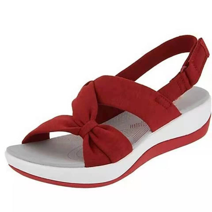 Stabile Sommer Sandalen für Damen mit Schleife. Komfortable Damenschuhe mit anatomischem Fußbett.