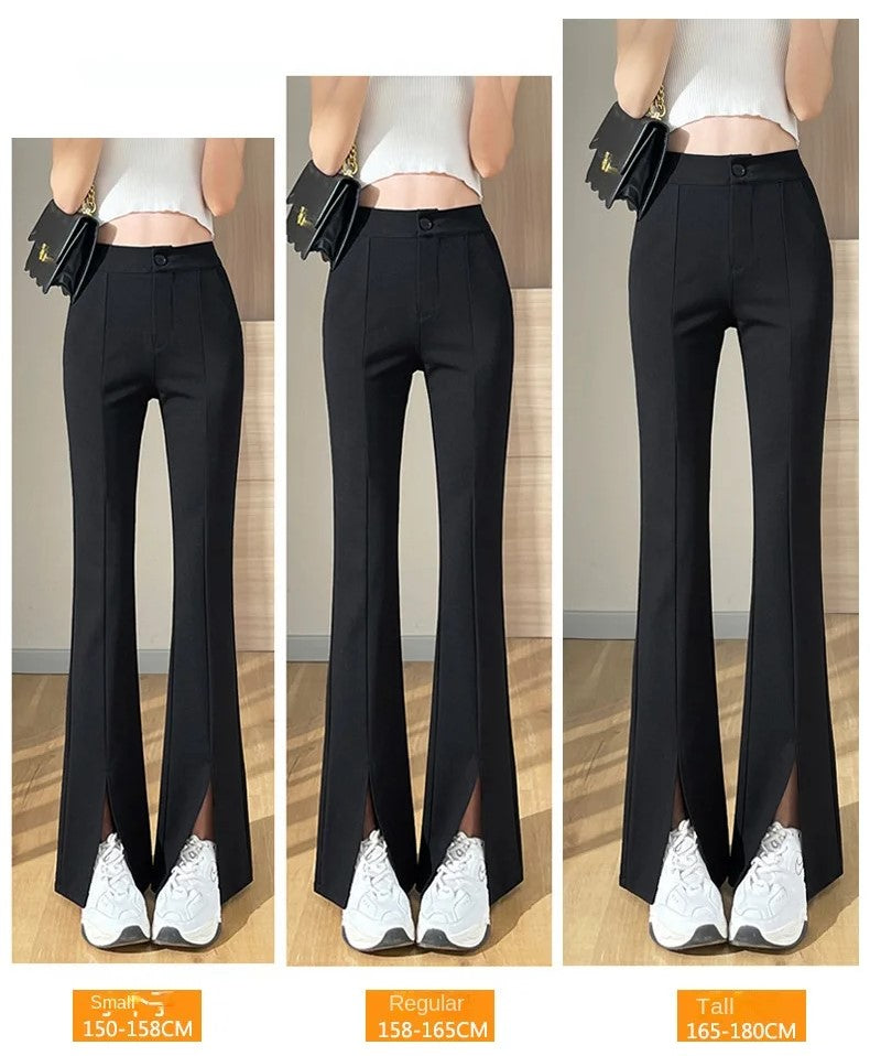 Eine Frau trägt eine schwarze Plus Size Schlaghose mit Schlitz und hohem Bund, elegant präsentiert.