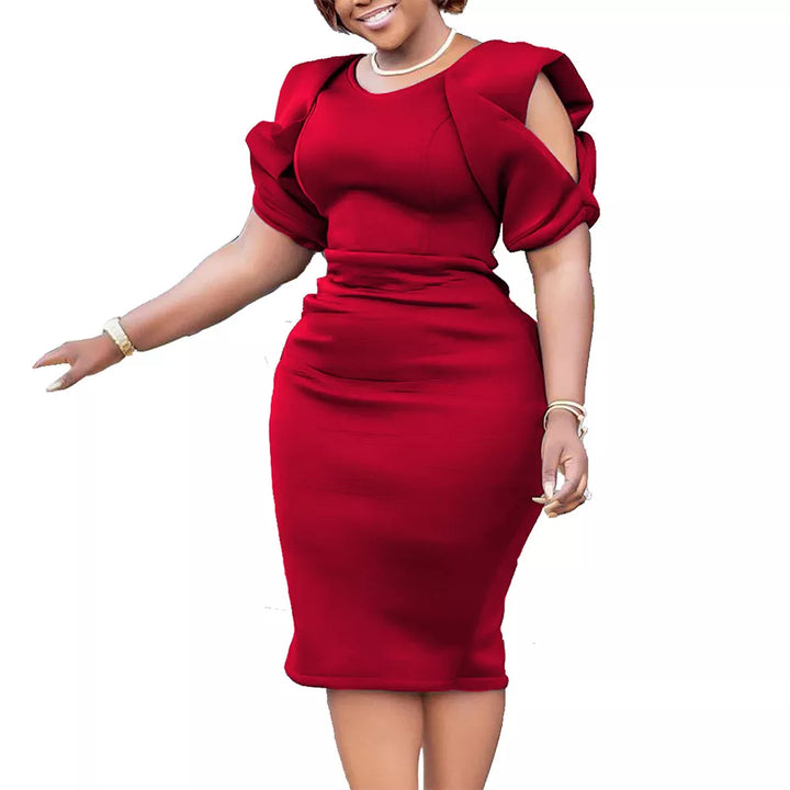 Kurzes Damenkleid in Übergröße, bequem und farbenfroh, mit trendigen Puffärmeln für Herbst und Übergang.