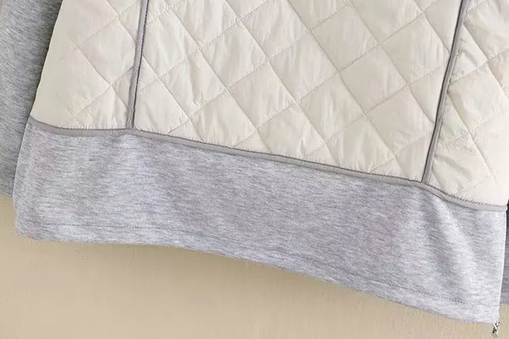 Modische Rauten Steppjacke für Damen in Übergröße mit warmer Kapuze, ideal für Herbst.