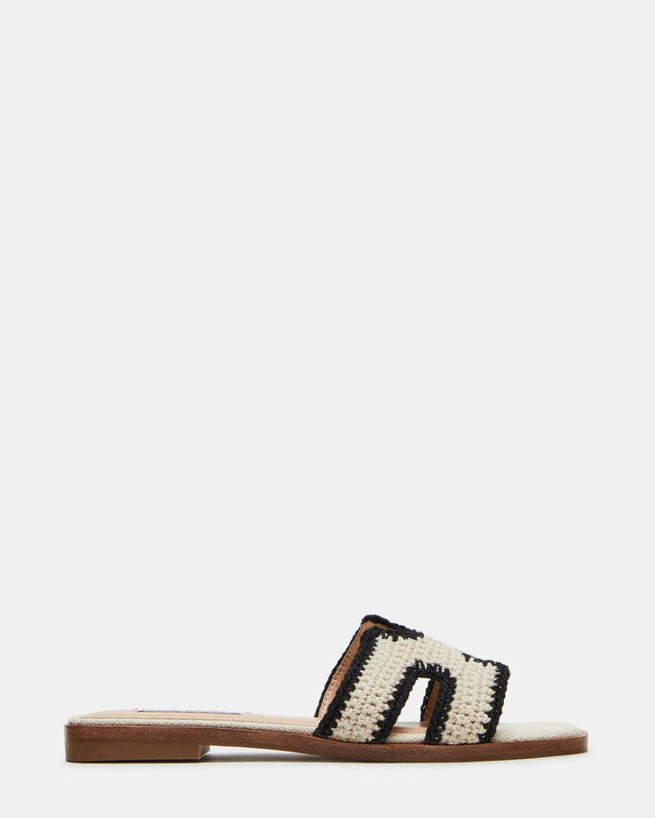 Damen-Pantolette mit breitem Riemen & flachem Absatz für sommerlichen Komfort und modernen Stil.