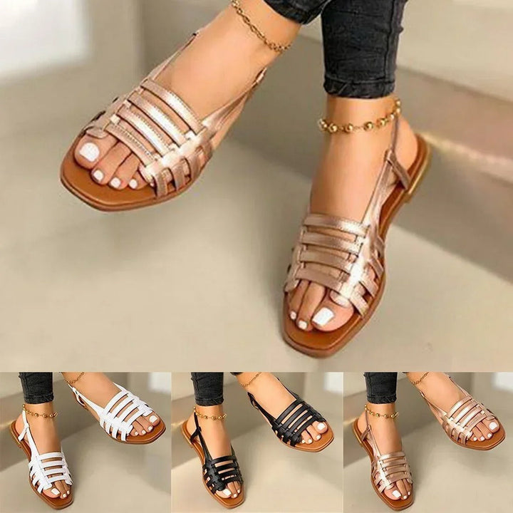 Damen flache Metallic-Sandalen im Römer-Stil. Bequeme Riemchensandalen mit offener Zehe, ideal für einen eleganten Sommer.