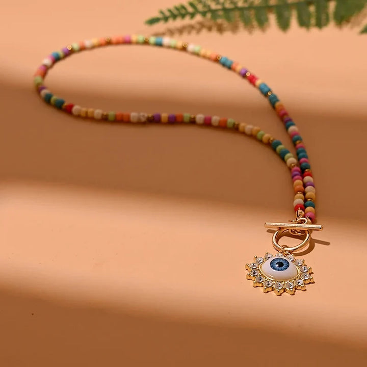 Frauen Evil Eye Schutzamulett Halskette mit runden Perlen, ideal als Geschenk.