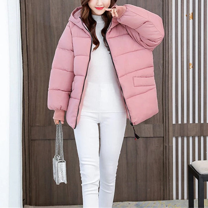 Damen Winter-Pufferjacke, lang und warm, mit Kapuze, im trendigen Oversize-Stil.