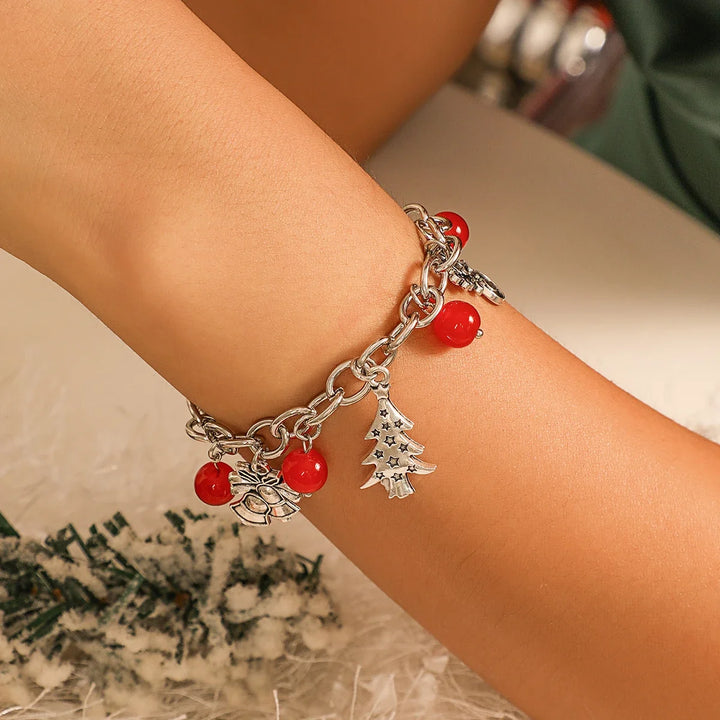 Elegantes Charme-Armband aus Sterling-Silber für Damen mit winterlichen Motiven. Schöne Geschenkidee.