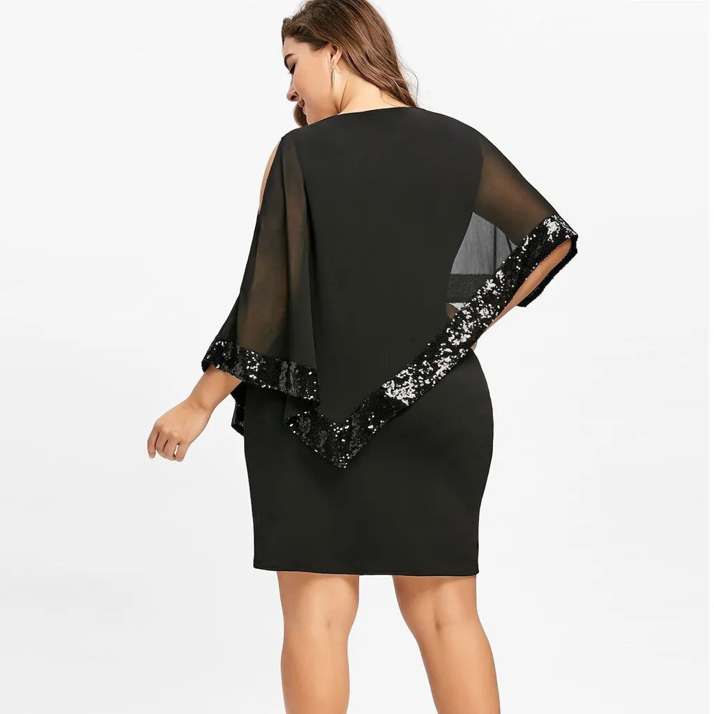 Paillettenkleid Übergröße, kombiniert mit High Heels und Clutch für den ultimativen Abend-Look.