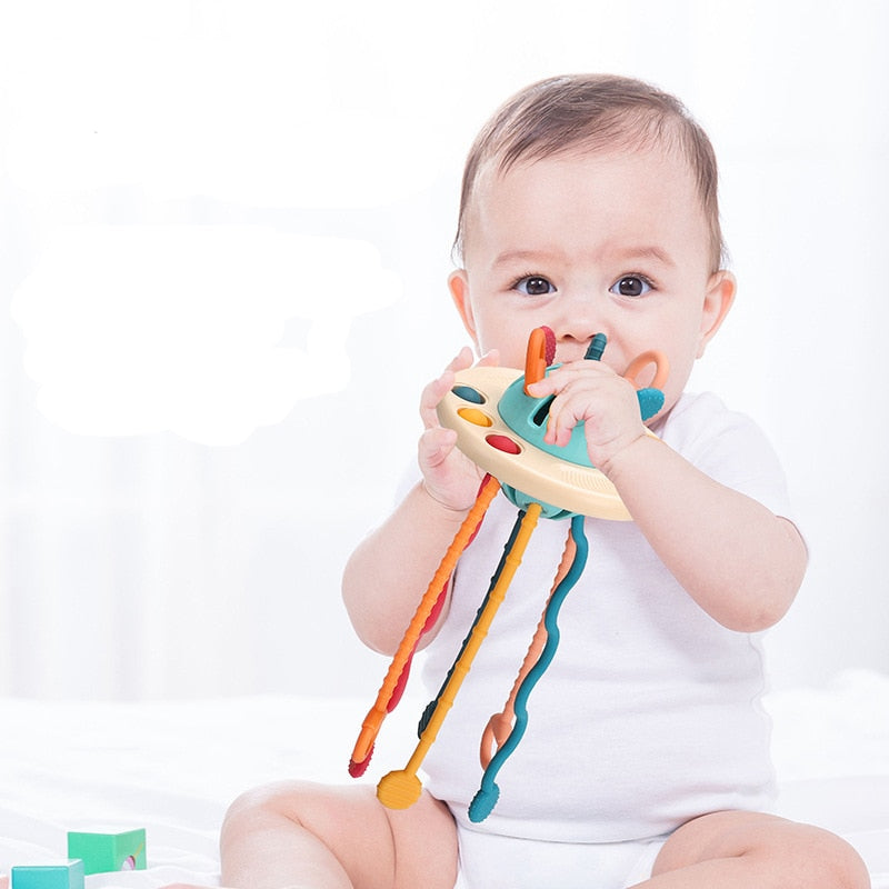 Multifunktionales Baby Ufo Spielzeug. Ideal für sensorische Erkundung, Greifübungen & frühe Lernphasen.