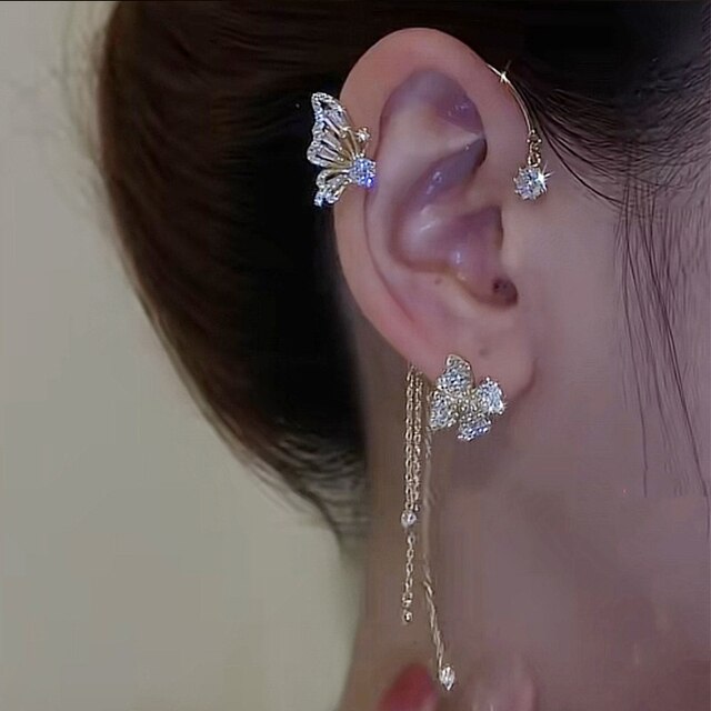 Damen Schmuck: Glitzernde Schmetterlings-Ohrmanschette, piercinglos, elegant, perfekter Ohrring-Ersatz.