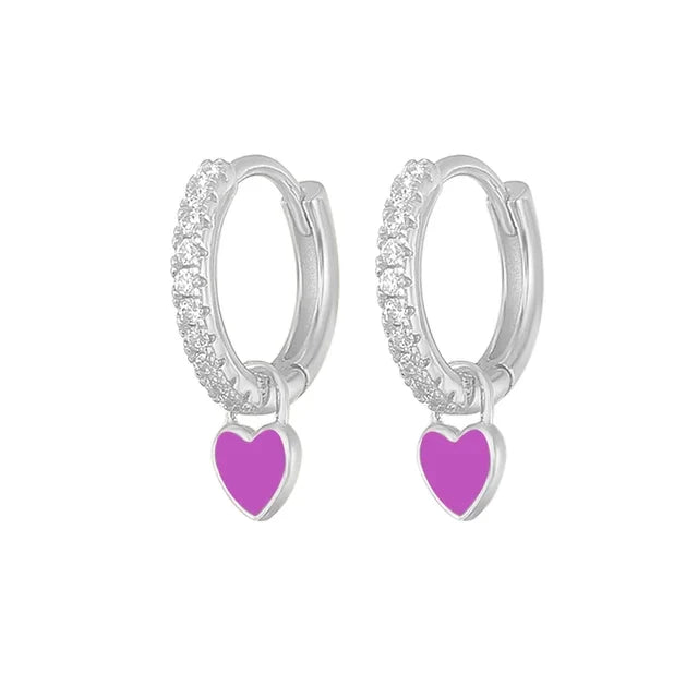 Modische Damen Creolen aus Silber mit funkelnden Zirkonia. Ideal für Alltag & Anlässe.