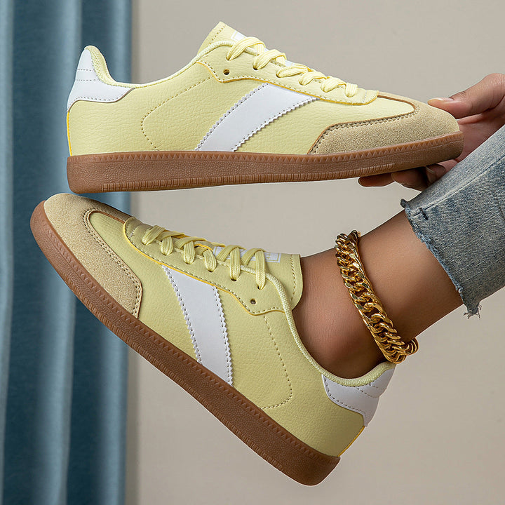 Gelb-grüne Damen-Sneaker, atmungsaktiv & rutschfest. Bequeme, leichte Schnürschuhe für Alltag & Freizeit.