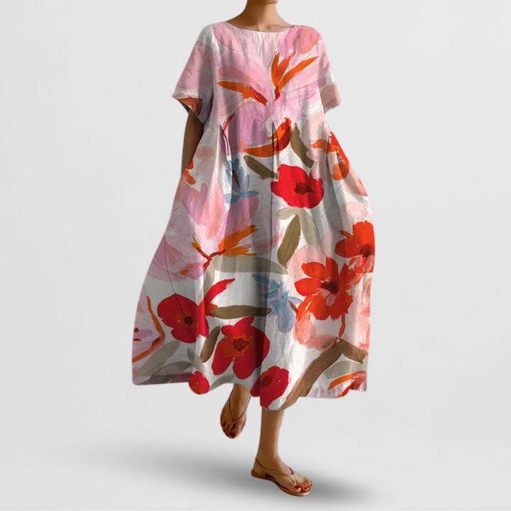 Bequemes Damen Freizeitkleid mit elegantem Blumenprint, lockerem Schnitt und Taschen, perfekt für Urlaub & Strand.