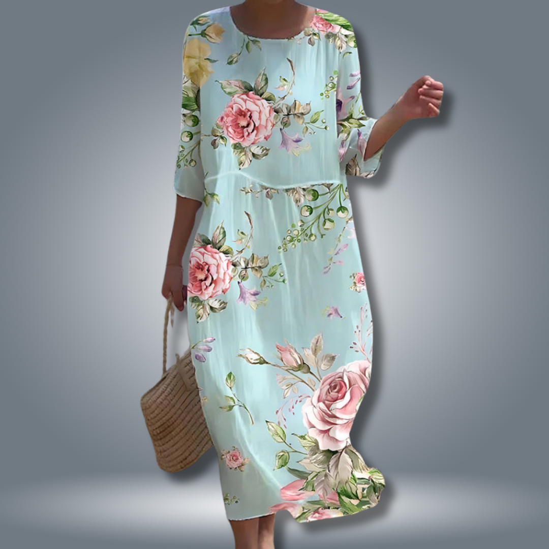 Elegantes Damen Sommerkleid mit romantischem Blumendruck, fließendem Stoff, 3/4-Arm und schmeichelhafter Smok-Taille.