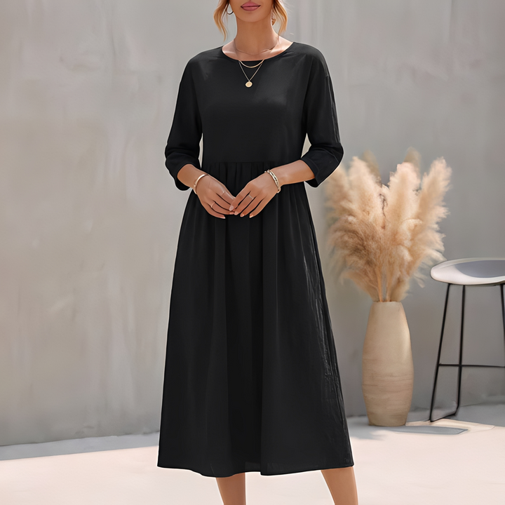 Stilvolles Damen Midi Freizeitkleid mit schmeichelhafter Empire-Taille, A-Linie und praktischen Seitentaschen.
