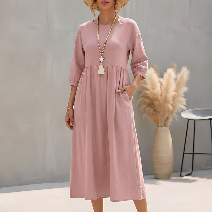 Elegantes Damen Midi Sommerkleid mit Empire-Taille, A-Linie und praktischen Seitentaschen, ideal für Freizeit.