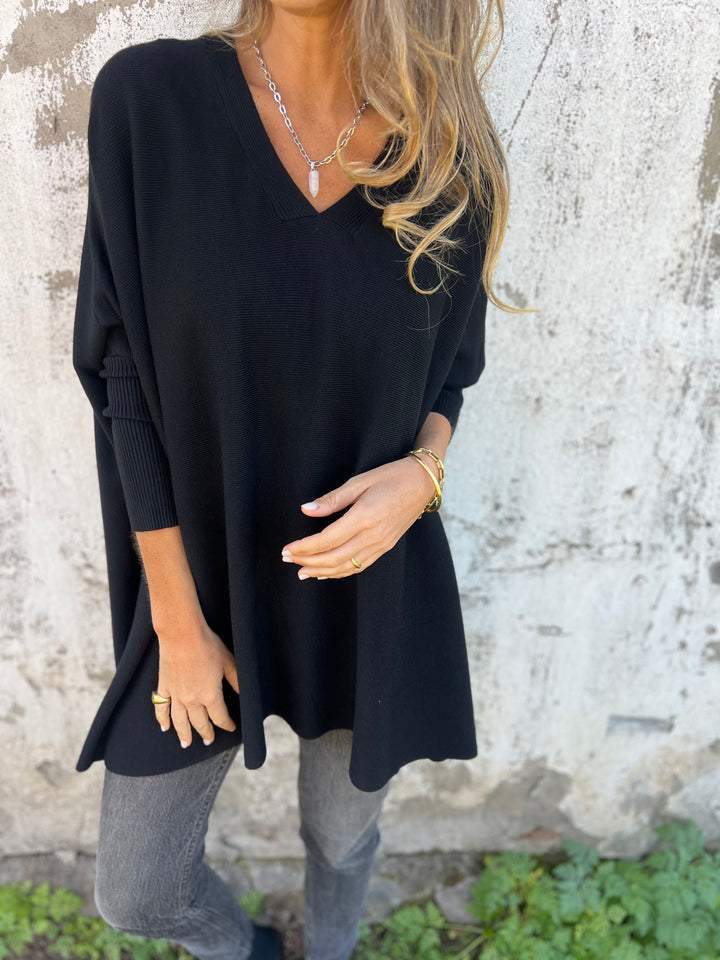 Damen Oversize Sweatshirt mit V-Ausschnitt, elegant & bequem für Freizeit. Lockerer Schnitt, ideal für Herbst/Frühling.