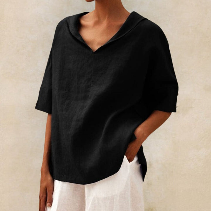 Damen Oversized Kurzarm Top mit V-Ausschnitt & elegantem Umlegekragen. Lässiges Sommermodell für Frauen.