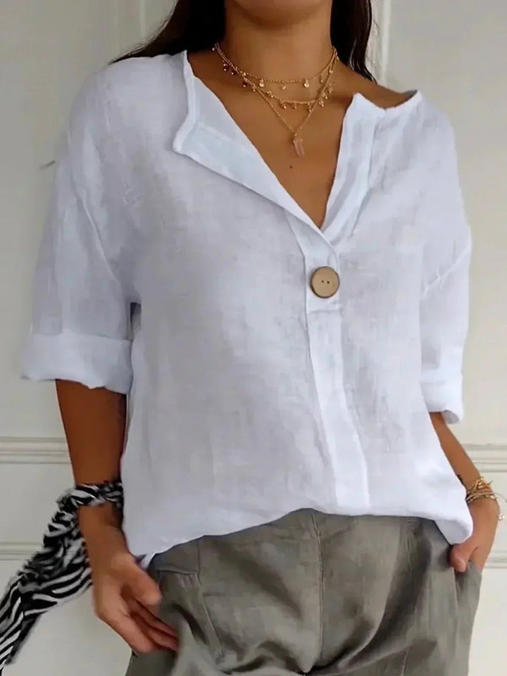 Stylisches Damen Top mit V-Ausschnitt und 3/4 Ärmeln, perfekt für Freizeit oder Büro im Frühling.