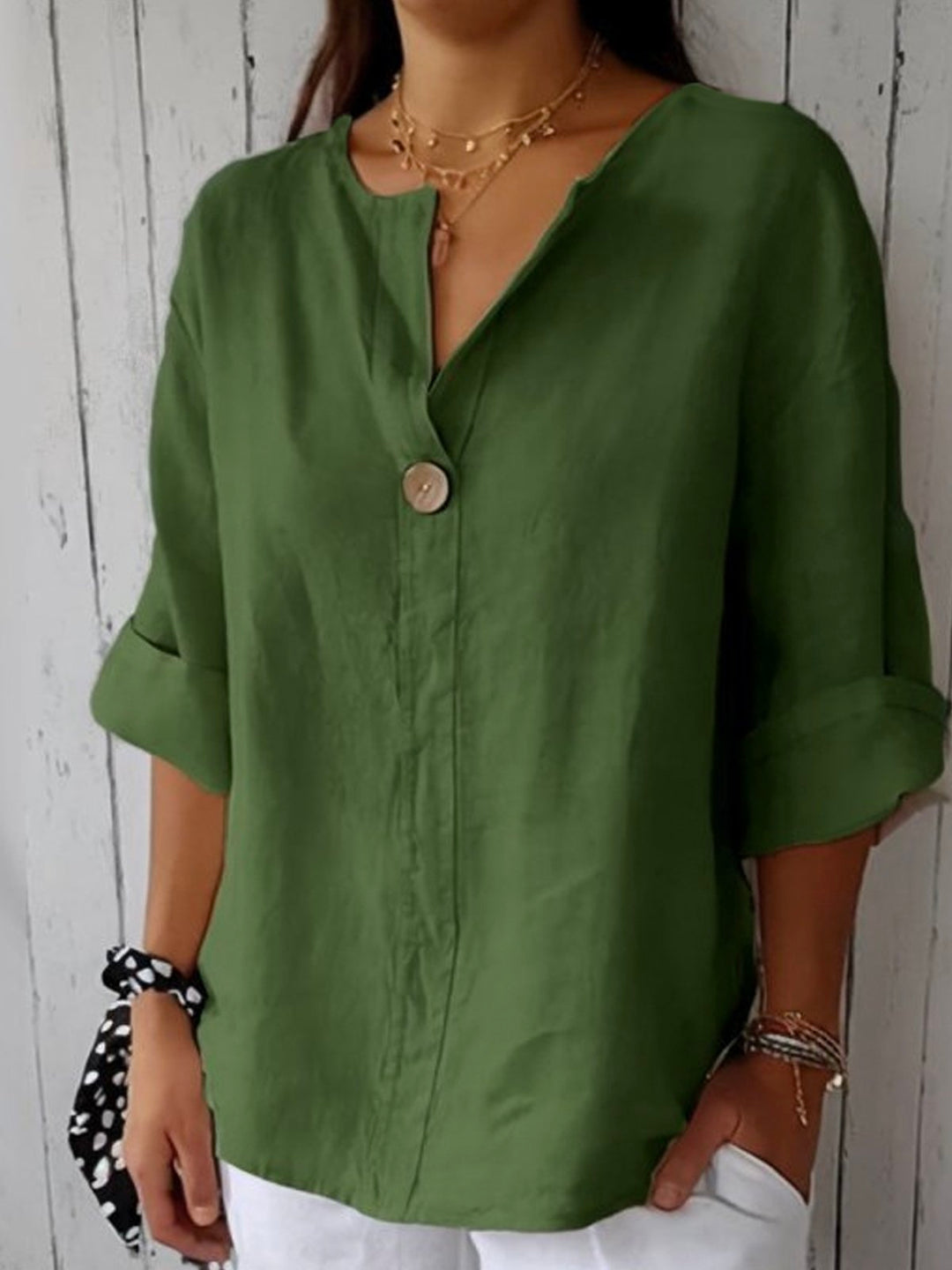 Elegantes Damen Blusentop mit V-Ausschnitt, 3/4 Ärmeln, ideal für einen lässigen oder schicken Stil.