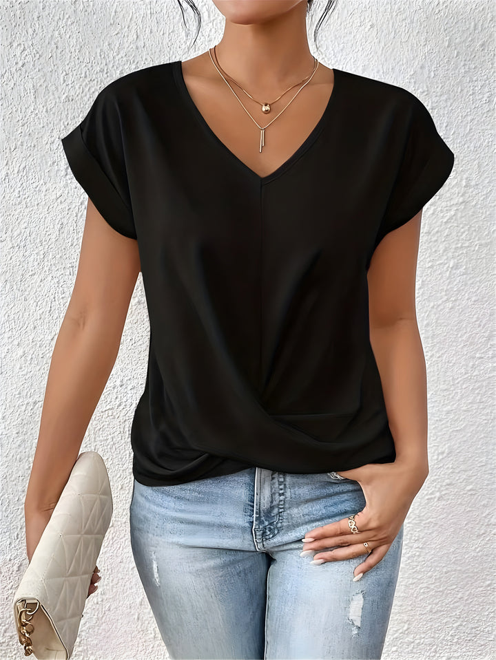 Elegantes Damen Kurzarm Top mit tiefem V-Ausschnitt und modischem Twist-Detail an der Front. Ideal für Freizeit.