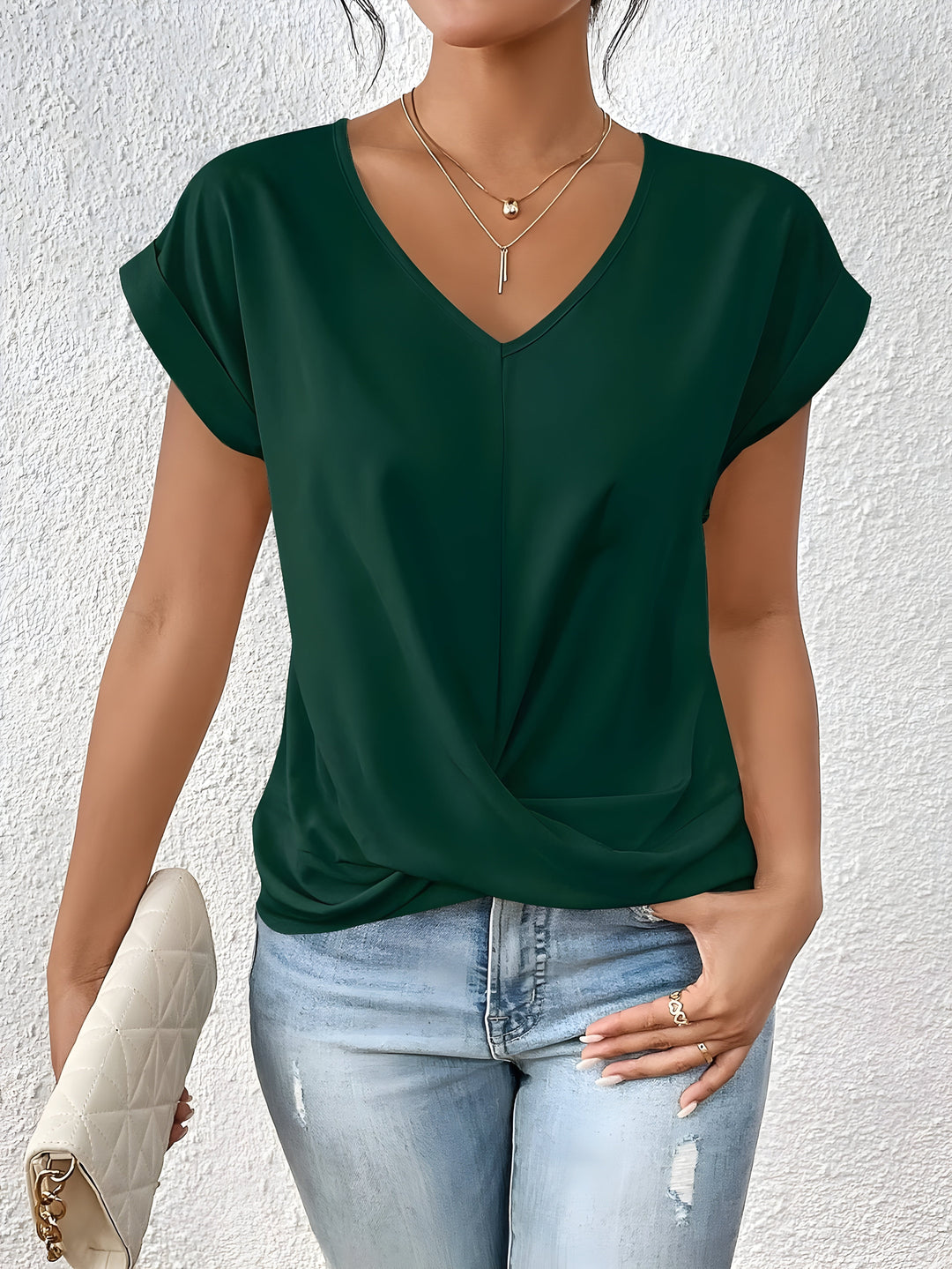 Luftiges Damen Sommer Top mit V-Ausschnitt und Twist-Front, kurzarm. Bequem und elegant für warme Tage.