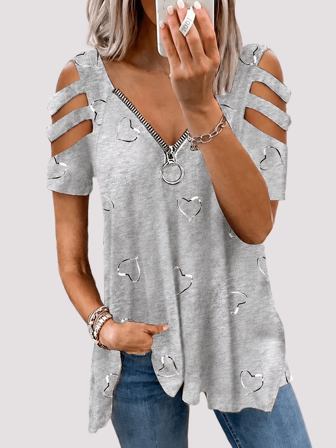 Vielseitiges Damen Top mit Herzprint, Cut-Out-Ärmeln und Reißverschluss-V-Ausschnitt für Sommer-Outfits.