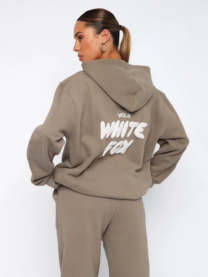 Gemütlicher Damen Loungewear Zweiteiler: Komfortabler Hoodie & Jogginghose für zu Hause oder unterwegs.