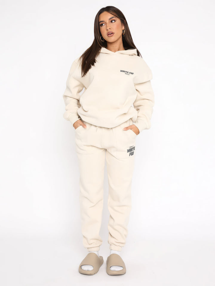 Sportlicher Damen Trainingsanzug: Bequemes Set aus Hoodie & Jogginghose, ideal für Fitness & Athleisure.
