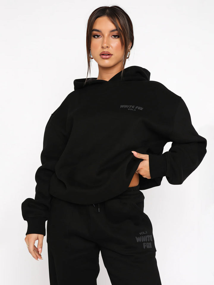 Damen Mode-Trainingsanzug: Trendiges Loungewear Set mit Kapuze und Hose für aktuelle Damenmode.