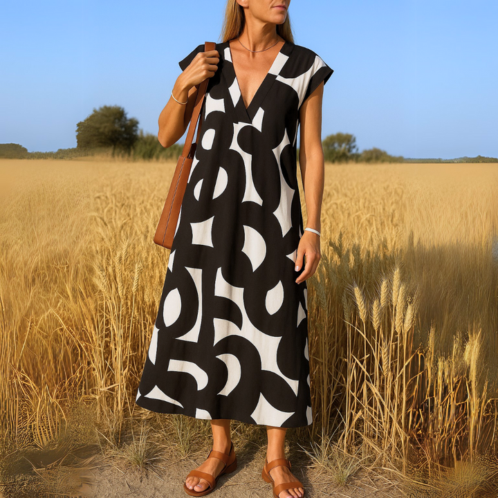 Bequemes Damen Maxikleid mit V-Ausschnitt & grafischem Muster, ideal als Alltagskleid oder für Urlaub.