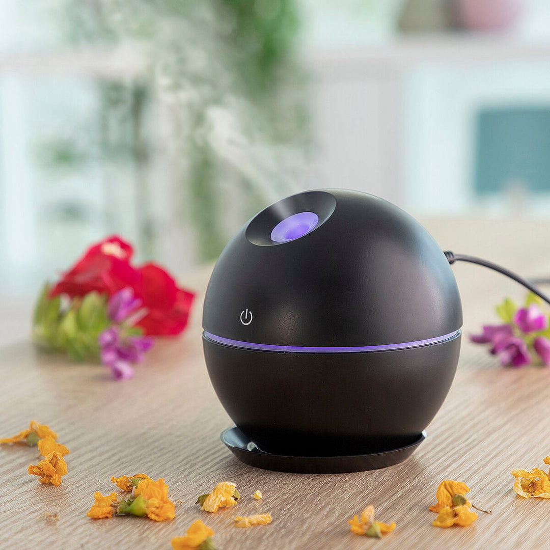 Kompakter Ultraschall Mini Aroma Diffusor mit LED-Beleuchtung für entspannende Aromatherapie & angenehmen Raumduft.