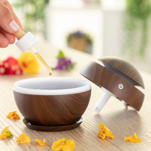 Kompakter USB Aroma Diffusor mit Ultraschall-Funktion, perfekt für Raumduft im Home Office oder unterwegs.