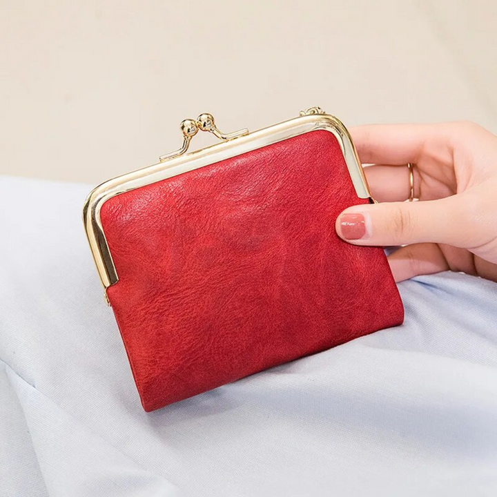 Hochwertige Vintage Damen Geldbörse, Kussverschluss, feine Textur, robustes und stilvolles Accessoire.