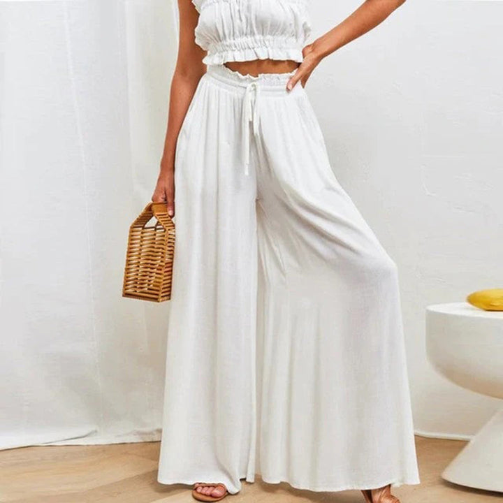 Bequeme Damen Wide Leg Hose mit hoher Taille und Gummibund. Perfekte Freizeithose für den Sommer.