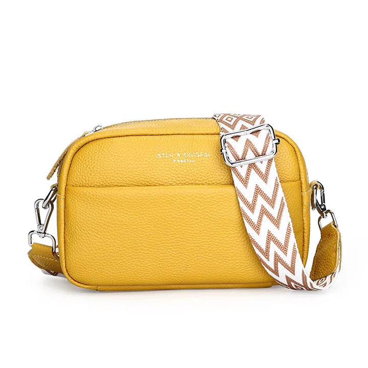 Innenansicht der kompakten Damen Handtasche, praktische Fächer für Organisation.